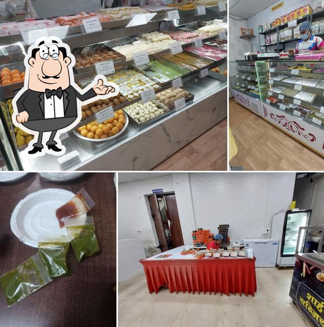 Take a seat at one of the tables at DE BABU BHAI CLOUD KITCHEN