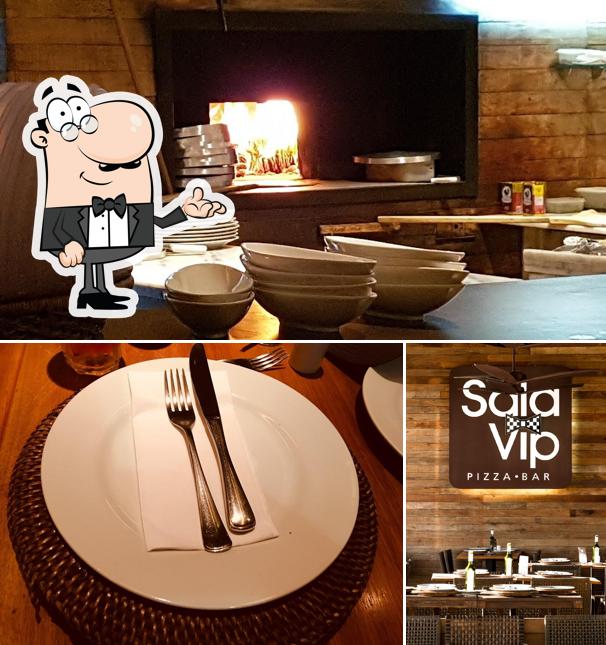 Veja imagens do interior do Sala Vip Pizza Bar