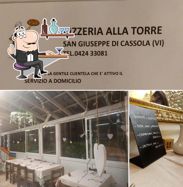 Dai un'occhiata agli interni di Pizzeria Alla Torre