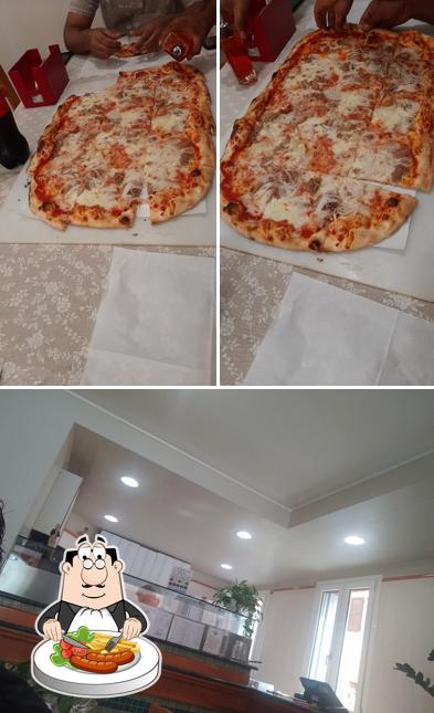 Dai un’occhiata alla foto che raffigura la cibo e interni di Pizzeria Il Delfino