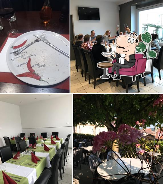 Siediti a un tavolo di Restaurant de la Poste, Gutaj & Cie