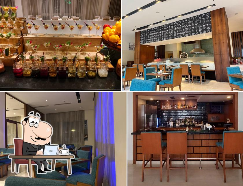 Take a seat at one of the tables at Kovai Kitchen