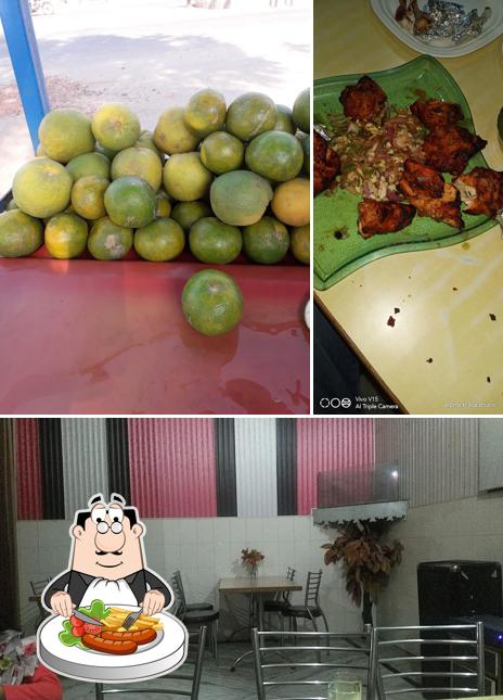 This is the photo showing food and interior at Hotel Mezban