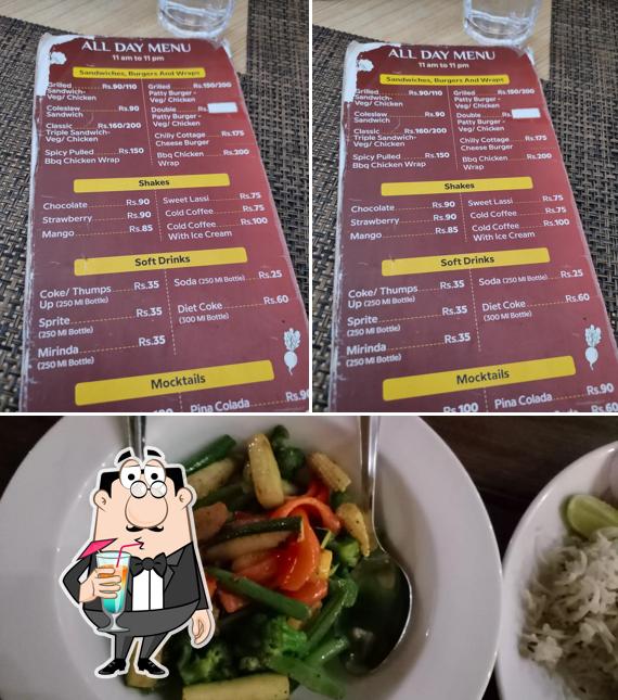 The photo of drink and food at Sandipani Hometel