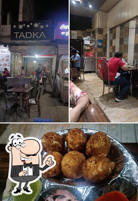 Take a seat at one of the tables at Tadka
