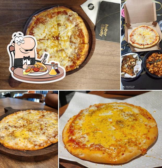 Get pizza at Huber & Holly (Rajkot)