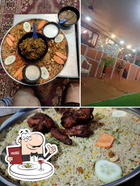 Check out the image depicting food and interior at S S Arabian Mandi