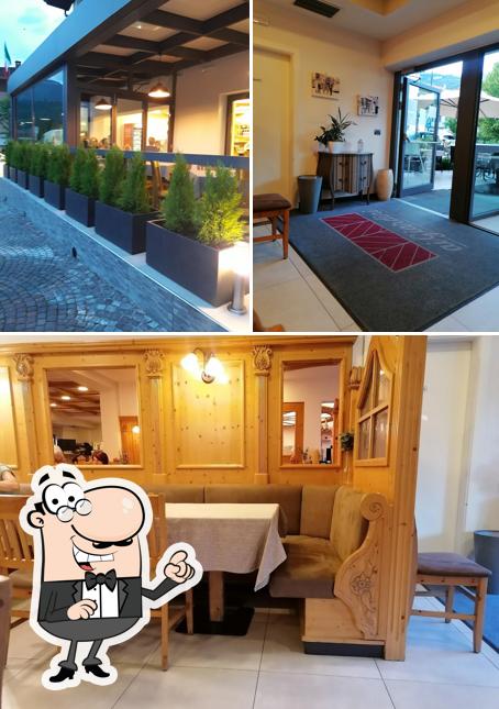 Dai un'occhiata agli interni di Pizzeria E Ristorante Ai Giardini