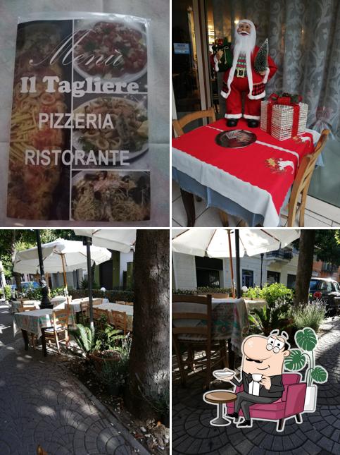 Dai un'occhiata agli interni di Pizzeria il Tagliere