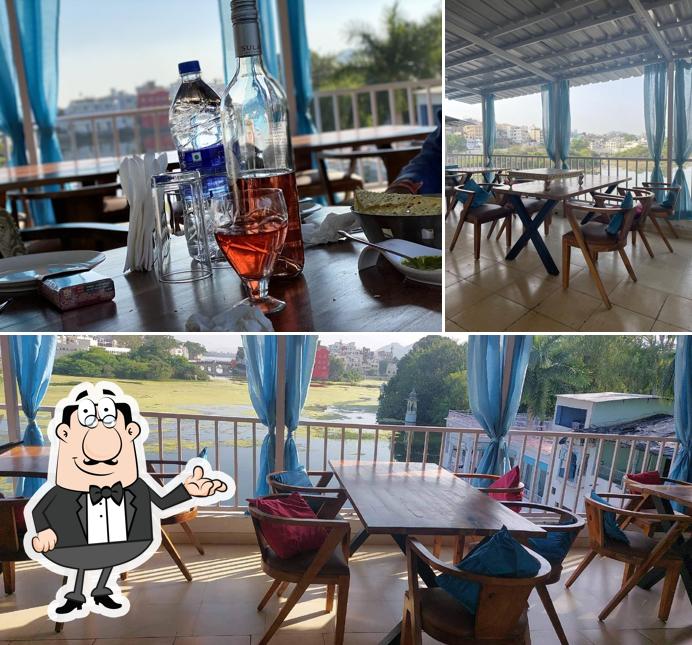 Take a seat at one of the tables at La Marina Bistro (Rooftop Lakeview Restaurant)