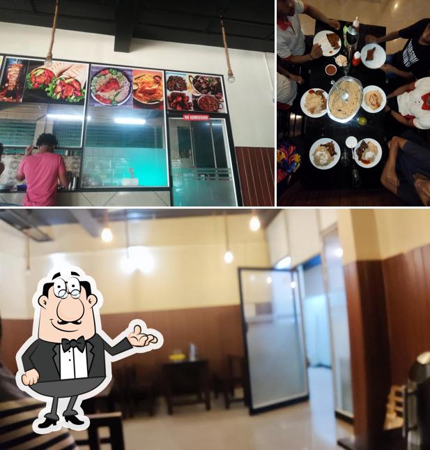 The interior of Mama Noora Kuzhimanthi Restaurant