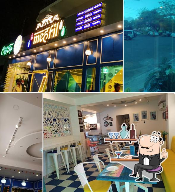 Check out how Happy Belly's Mehfil Restaurant ---A Multicuisine Restaurant looks inside