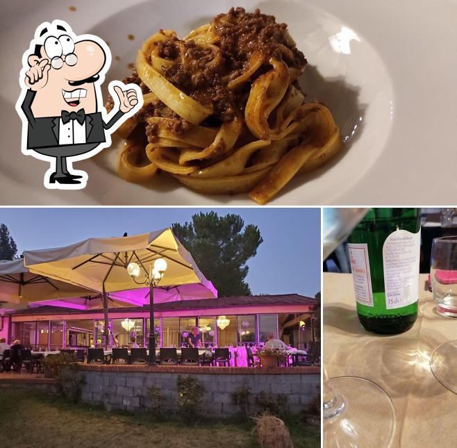 Dai un’occhiata alla foto che mostra la interni e cibo di Pizzeria Il Pettirosso