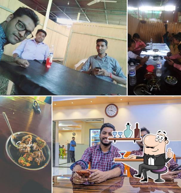 Take a seat at one of the tables at HOTEL PANCHAVATI