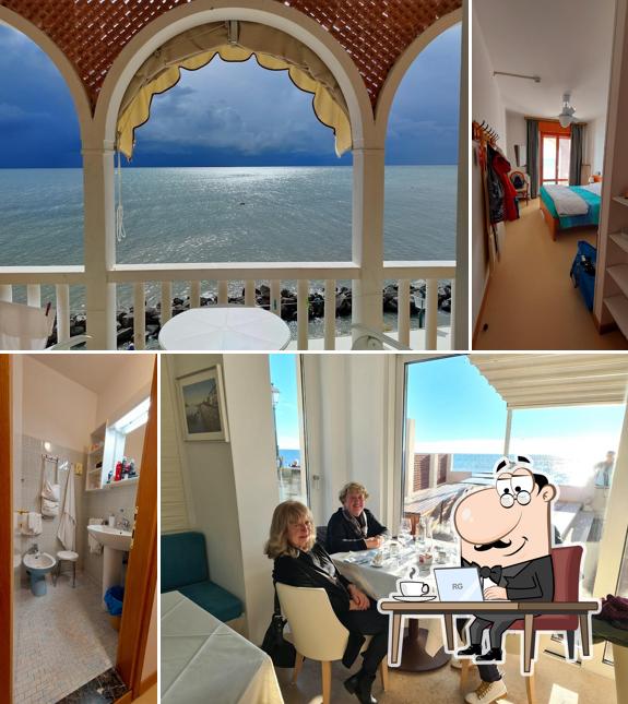 Siediti a un tavolo di Hotel Villa Marin