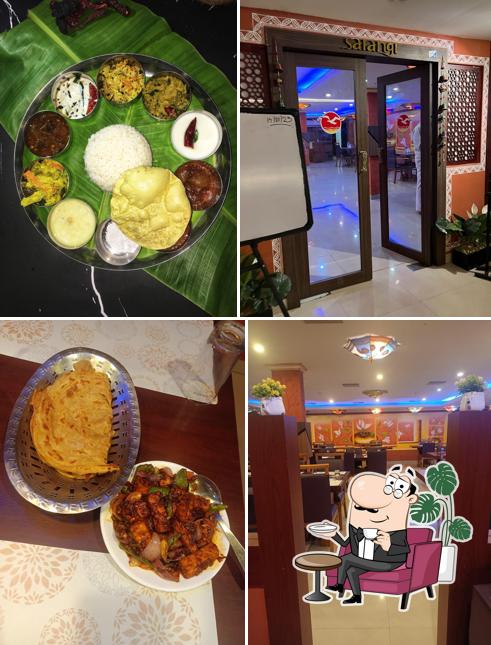 Take a seat at one of the tables at Sarangi restaurant