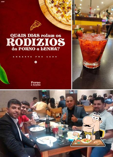 Dê uma olhada a ilustração mostrando comida e interior a Pizzaria Forno à Lenha