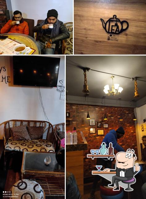 Take a seat at one of the tables at Chai Bar