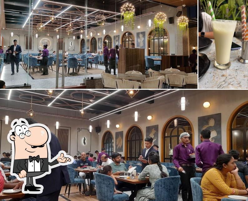 Check out the image showing interior and beverage at FBK - FEN'S BACKYARD KITCHEN