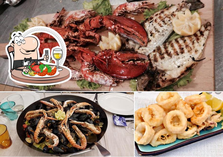 Goditi i sapori della cucina di mare a Ristorante Pizzeria Corte del Sole