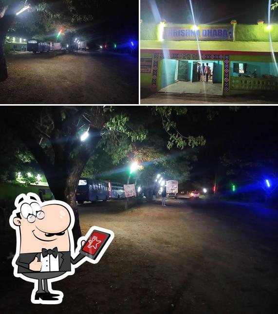 Take a look at the picture displaying exterior and interior at Krishna dhaba