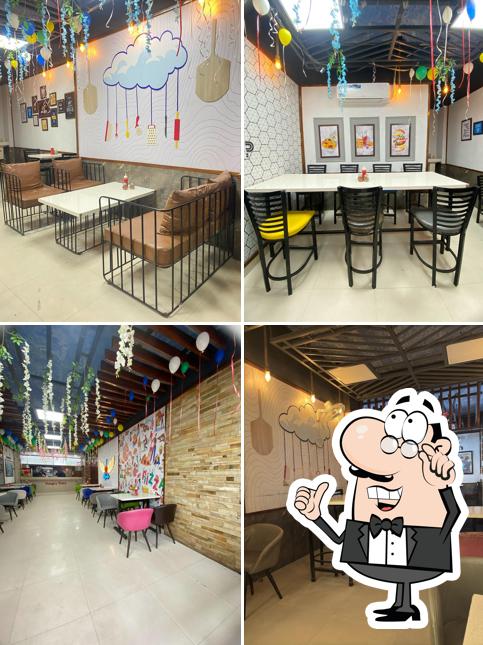 Take a seat at one of the tables at Hungry Point - Hardware