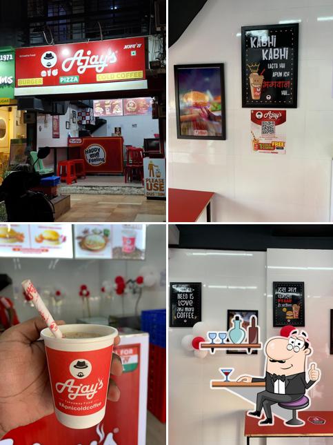 Take a seat at one of the tables at Ajay's