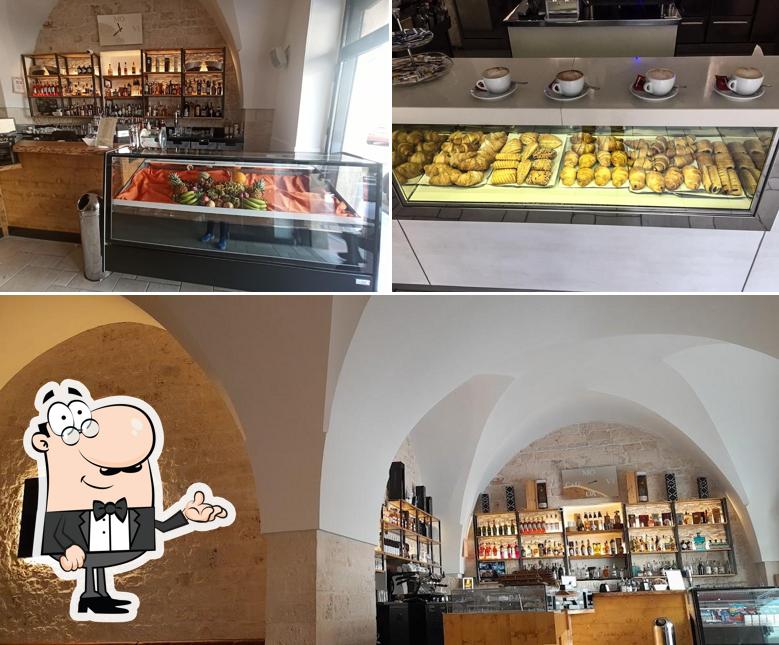 Siediti a un tavolo di Movida Cafe'