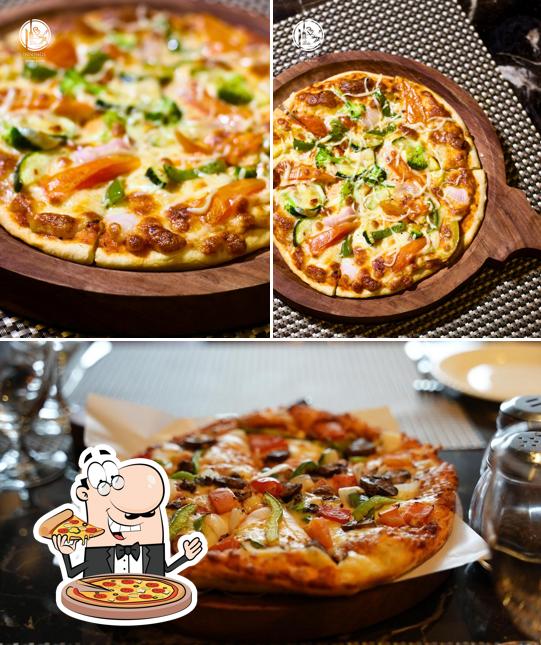 Try out pizza at Innings Restro & Cafe