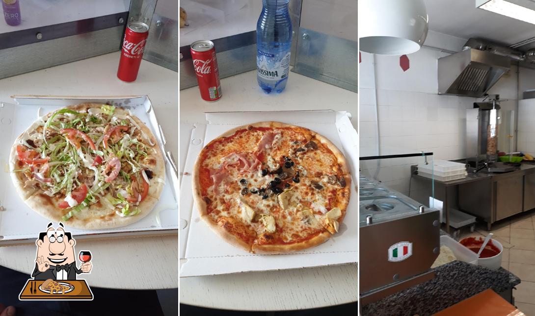 A Pizzeria d'asporto Due Dadi di Mahmoud Abdallah, puoi goderti una bella pizza