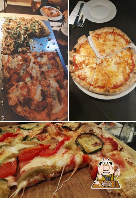 A Pizzeria L'Acquario, puoi prenderti una bella pizza