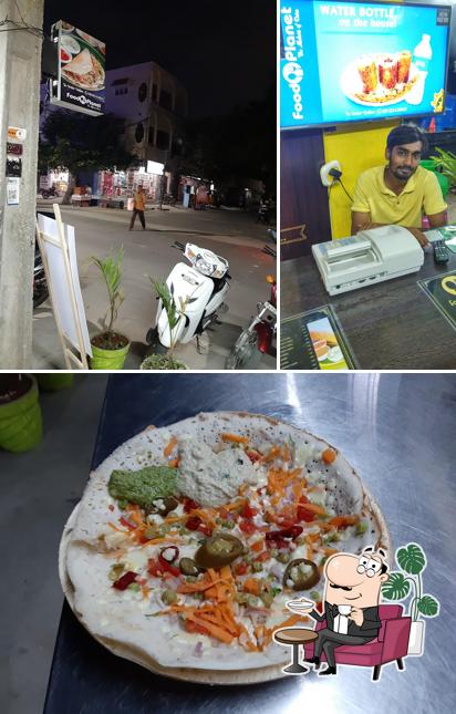 This is the image depicting interior and food at Food planet