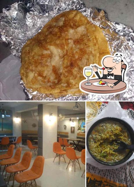Check out the image showing food and interior at Saffron E-cafe