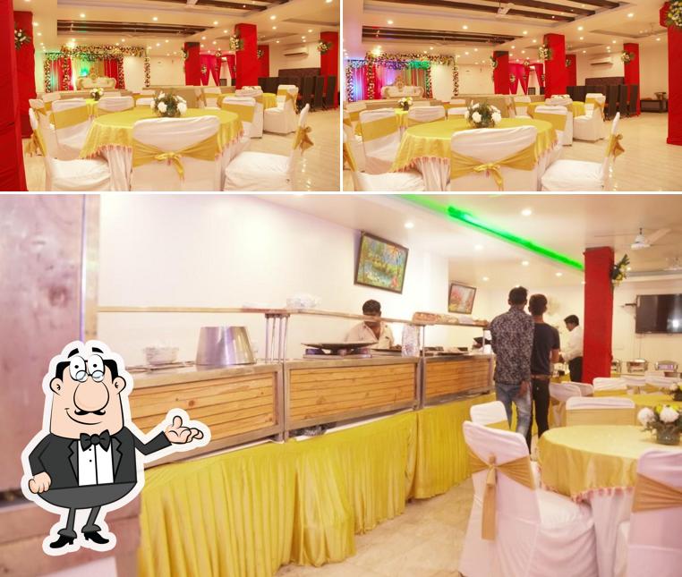 Take a seat at one of the tables at Food Ganesha