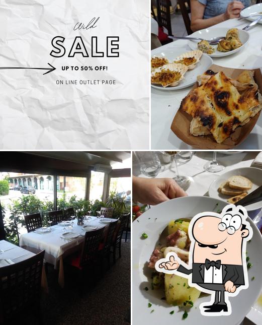 Siediti a un tavolo di Ristorante Capriccio. Pizzeria