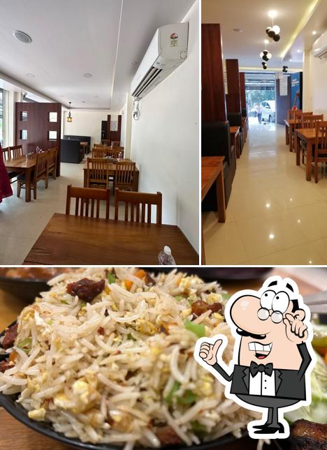 Take a look at the picture displaying interior and food at V- Al Saj Restaurant
