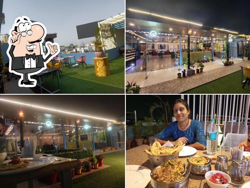 Take a seat at one of the tables at Food Orbit The Garden Caff