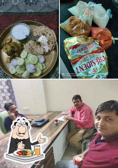 Check out the photo showing food and interior at Kapil Da Dhaba