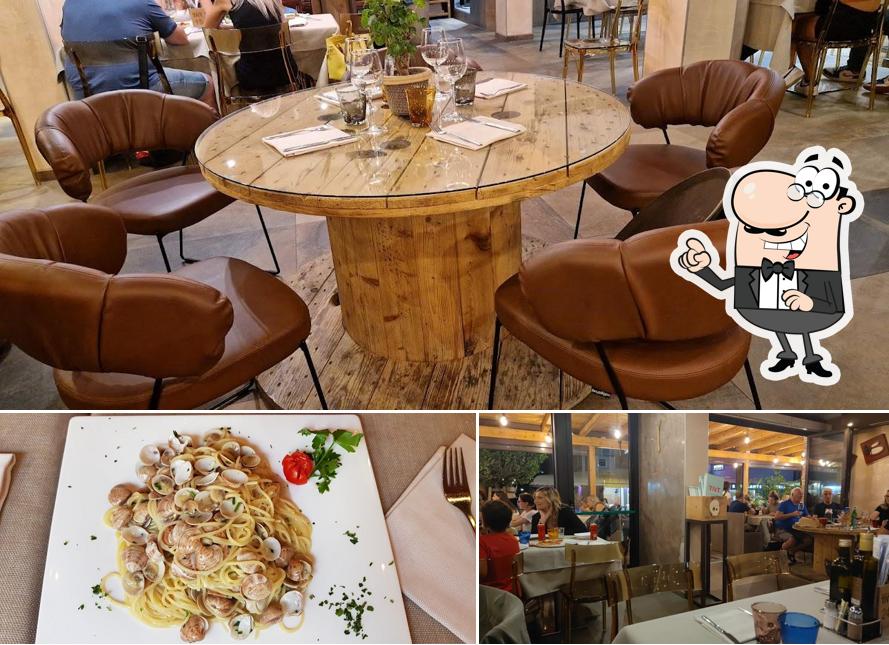 Questa è la foto che presenta la interni e cibo di Pizzeria TNT