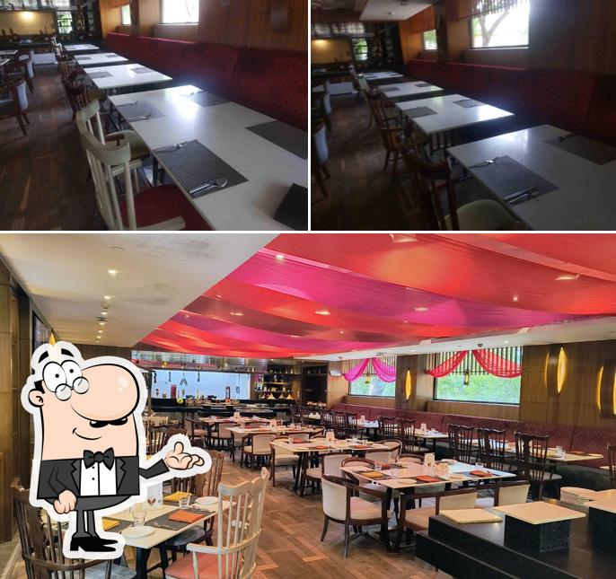 Take a seat at one of the tables at Indish