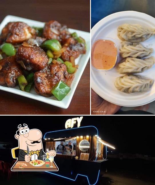 This is the picture showing food and interior at Afy the blue wagon