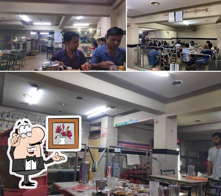 Check out how CAUVERY VEG RESTAURANT (PUNJABI KHANA) looks inside
