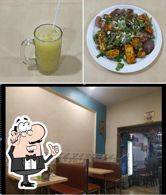 The image of Sai Sagar Veg Restaurant’s interior and beverage