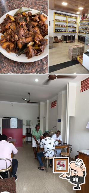 Take a seat at one of the tables at Ayodhya Seafood Lunch Home