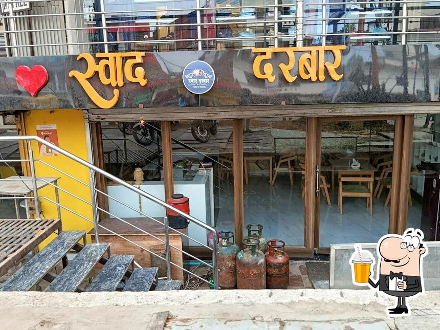 Enjoy a beverage at Swad Darbar