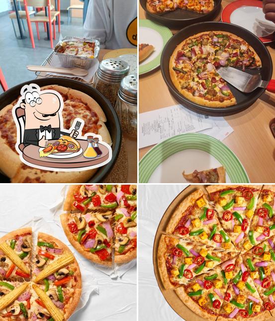 Pick pizza at Pizza Hut Oasis Mall, Dehradun