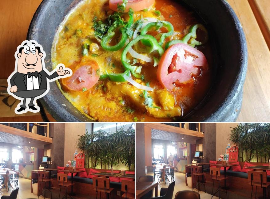 A ilustração da interior e comida no Mariposa Pelourinho