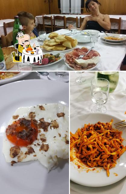 Questa è la foto che presenta la cibo e tavolo da pranzo di Osteria Baldini Marta
