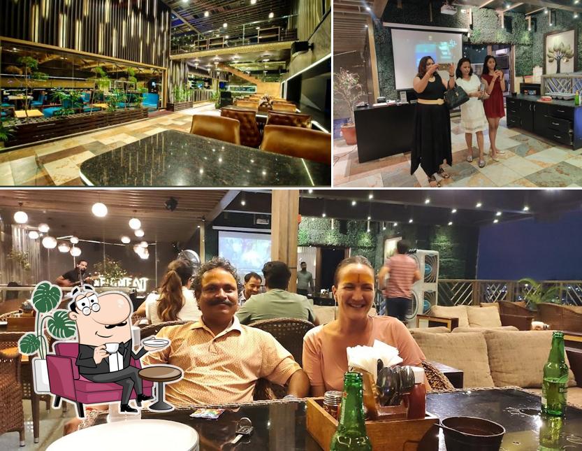 Take a seat at one of the tables at Retreat Drink N Dine