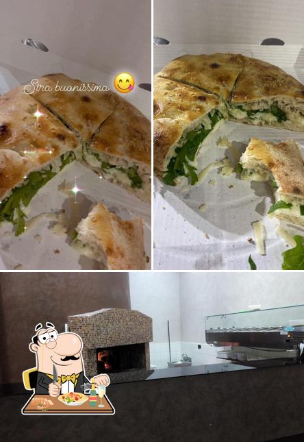 Guarda la foto che mostra la cibo e interni di L'angolo del gusto